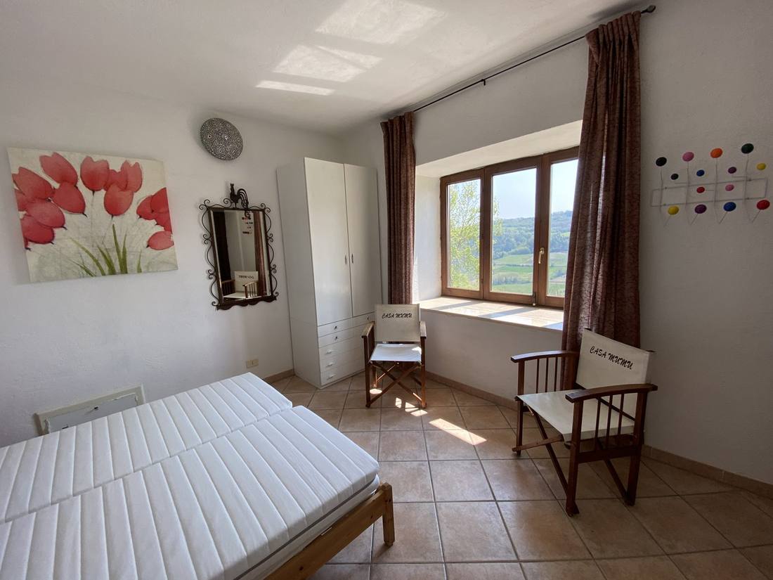 Slaapkamer 2 met uitzicht over de vallei